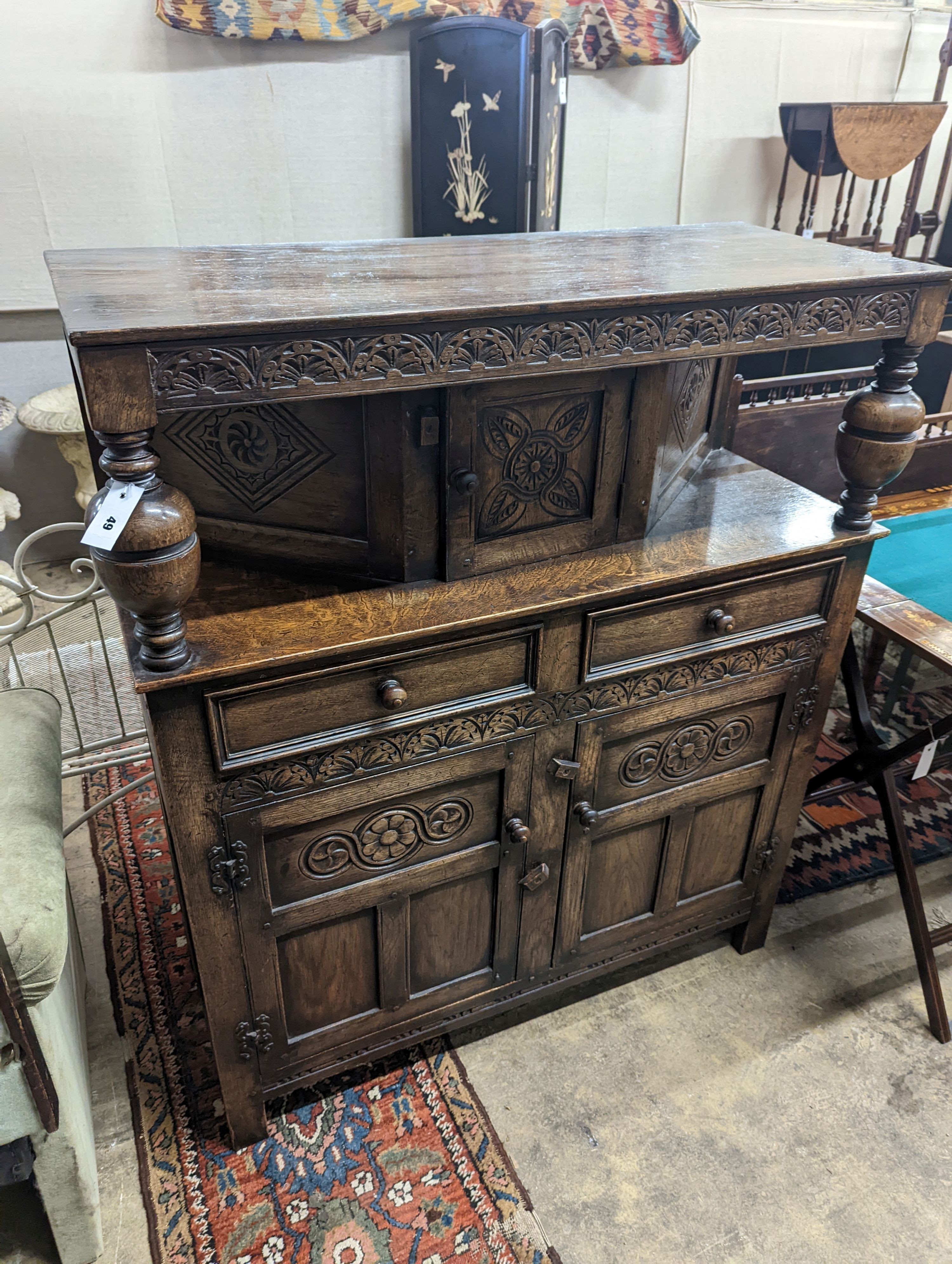 An 18th century style oak court cupboard, length 108cm, depth 43cm, height 128cm